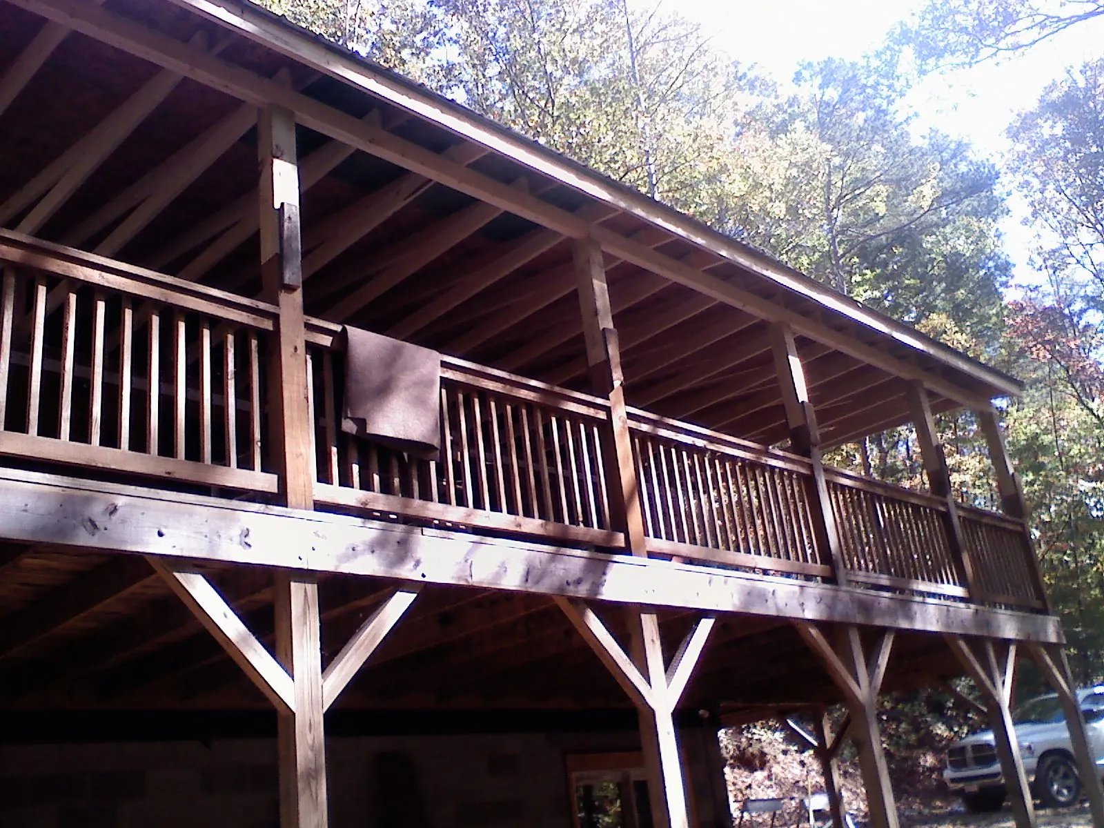 Timber framing under a new elevated porch and deck — Roof Leak Repair in Farmington by Roofing Brothers
